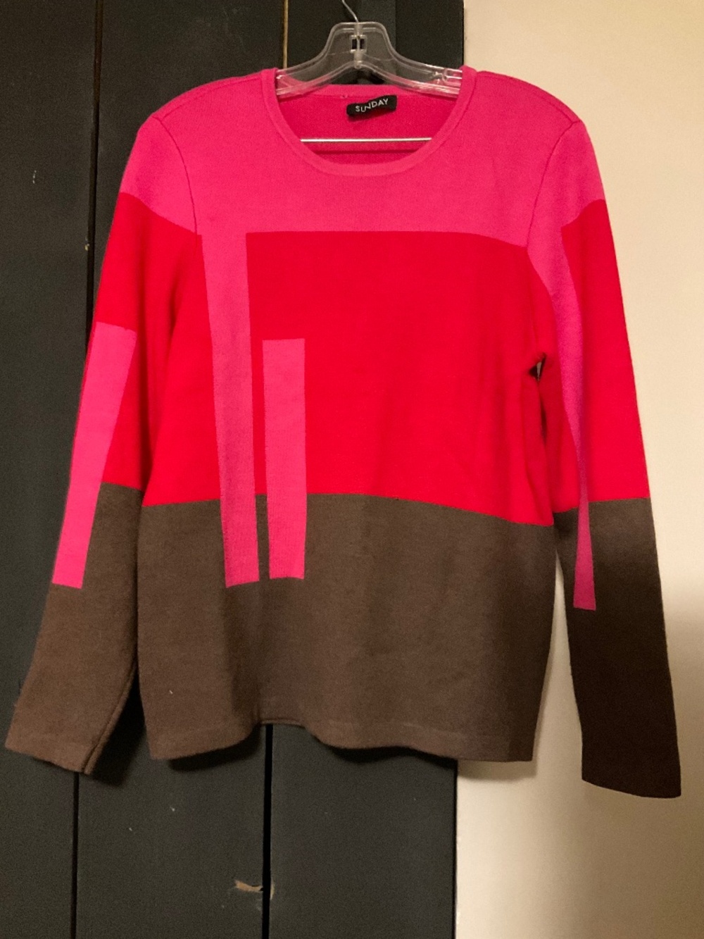 Sweater by SUNDAY in size medium.